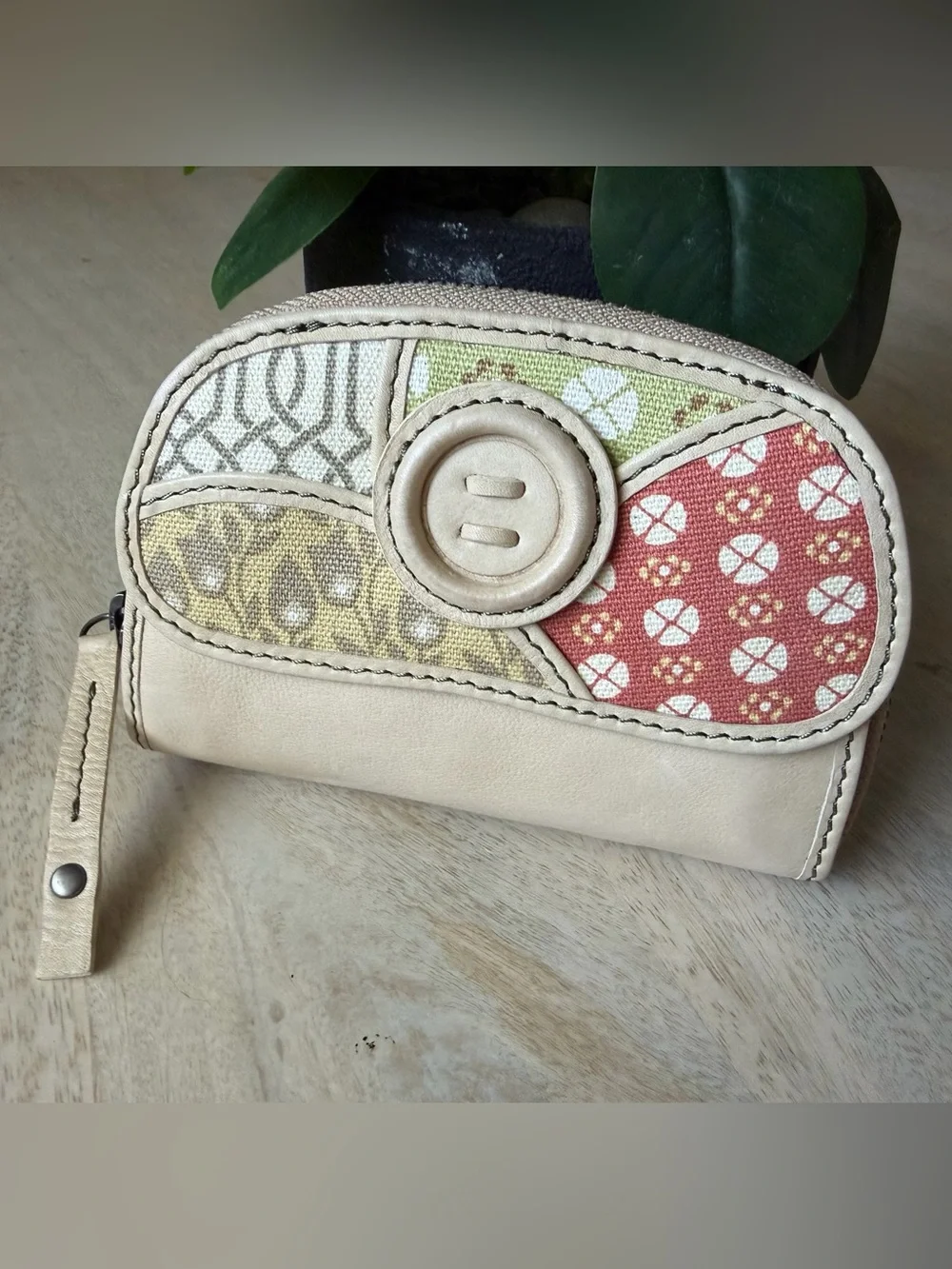 Fossil brand light Beige Patchwork Leather zip around Wallet with Button detail